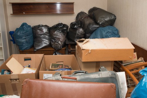 Charity workers collecting donated furniture in Ealing